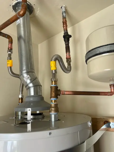 Water heater installation and plumbing repair in South End